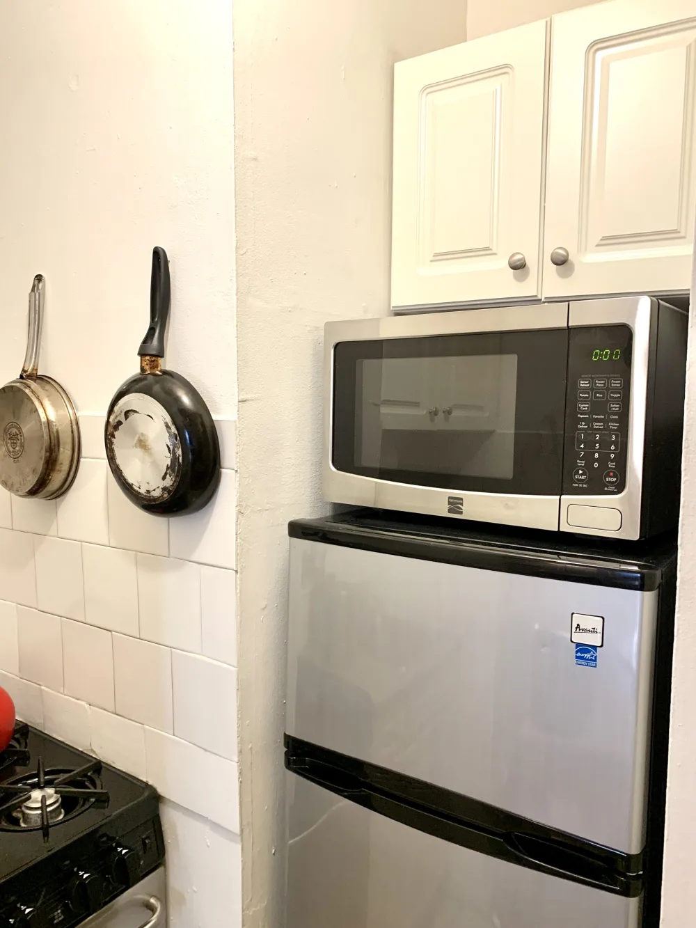 Compact kitchen with modern appliances.