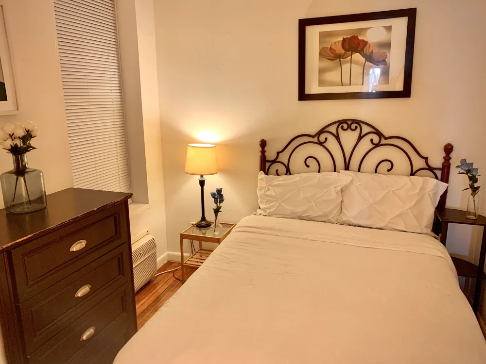 Cozy bedroom with decorative elements.