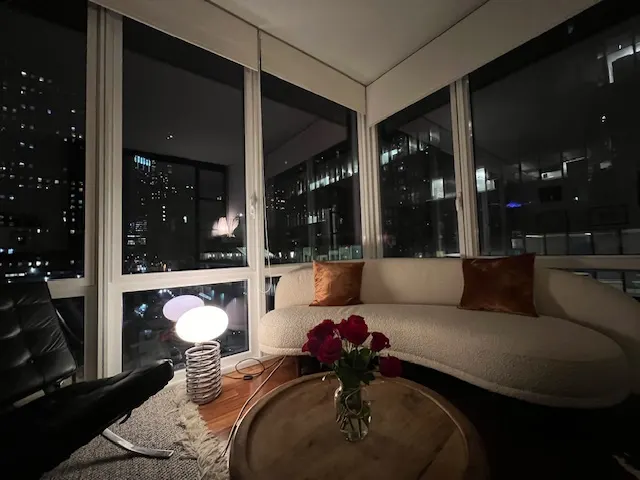 Modern living room with city view.
