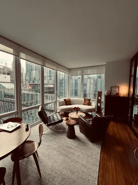 Modern living room with city view.