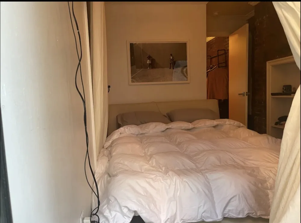 Cozy small bedroom with decor.