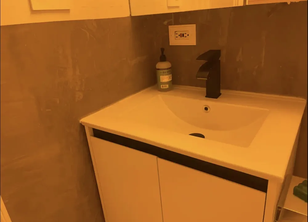 Modern bathroom sink with mirror.