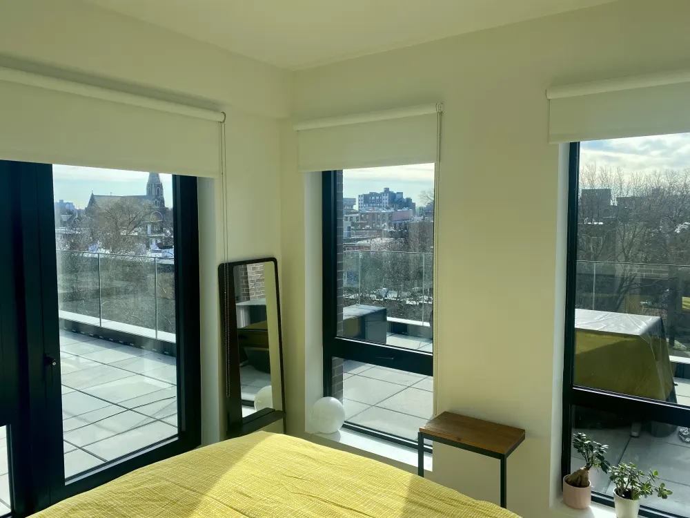 Bright room with large windows.