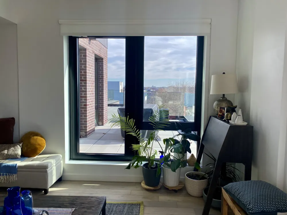 Bright room with large window.