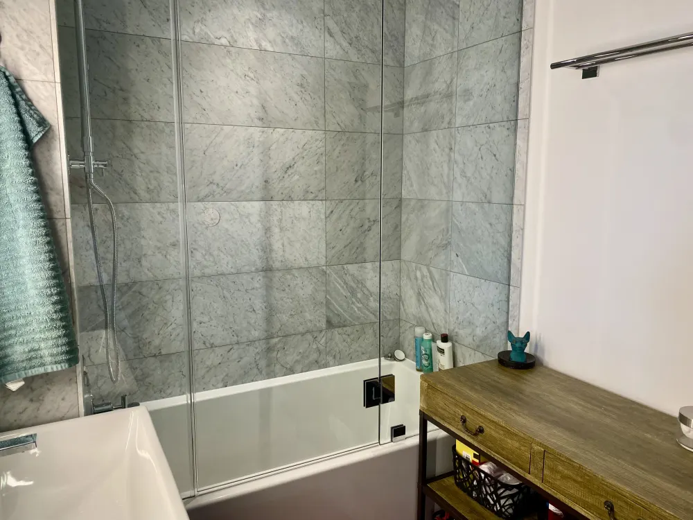 Modern bathroom with marble tiles.