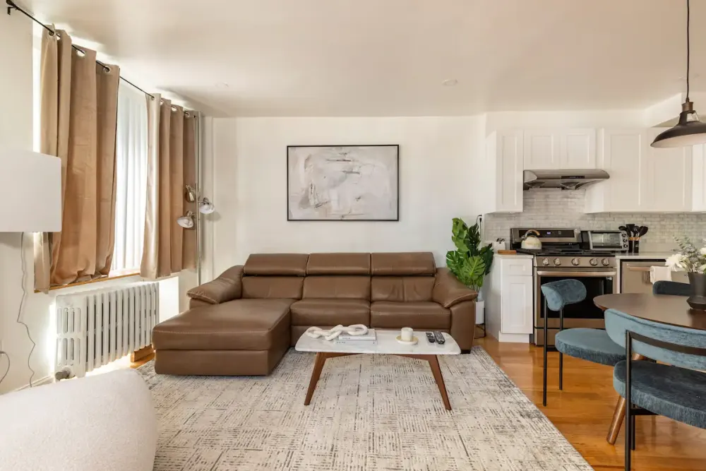 Modern living room with kitchen.
