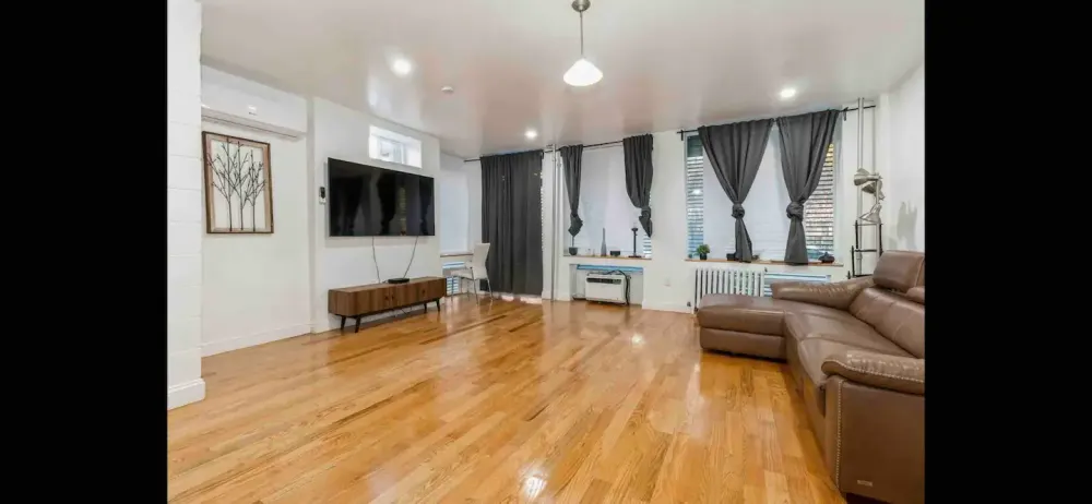 Spacious living room with sofa.