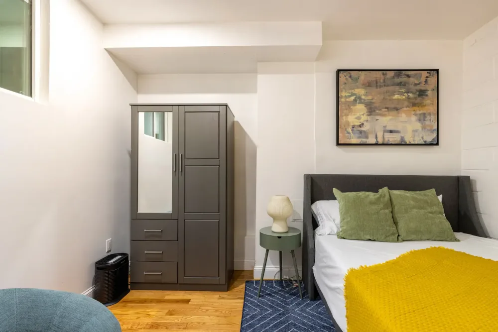 Cozy bedroom with modern furnishings.