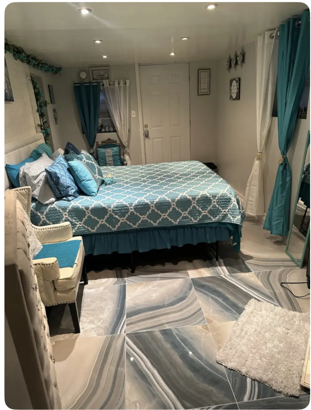 Elegant bedroom with blue decor.