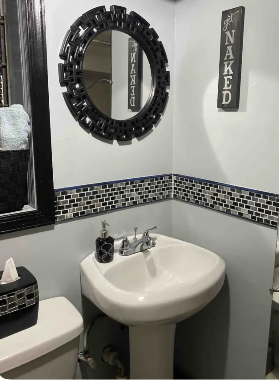 Modern bathroom with stylish decor.