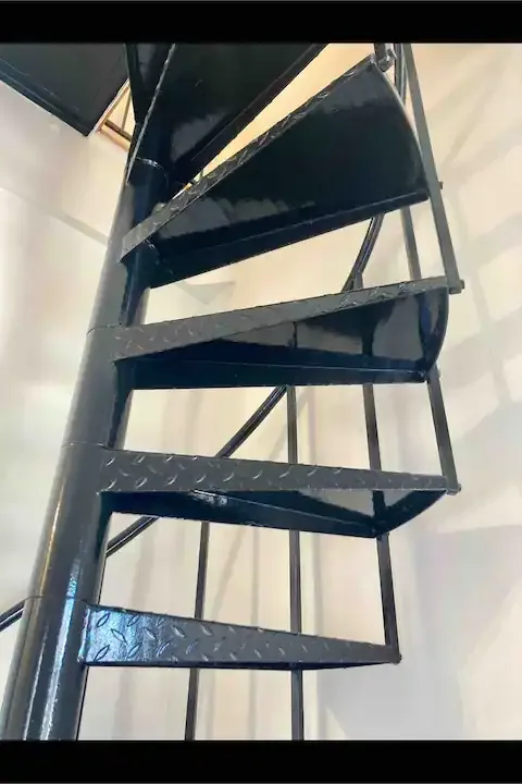 Modern black metal spiral staircase