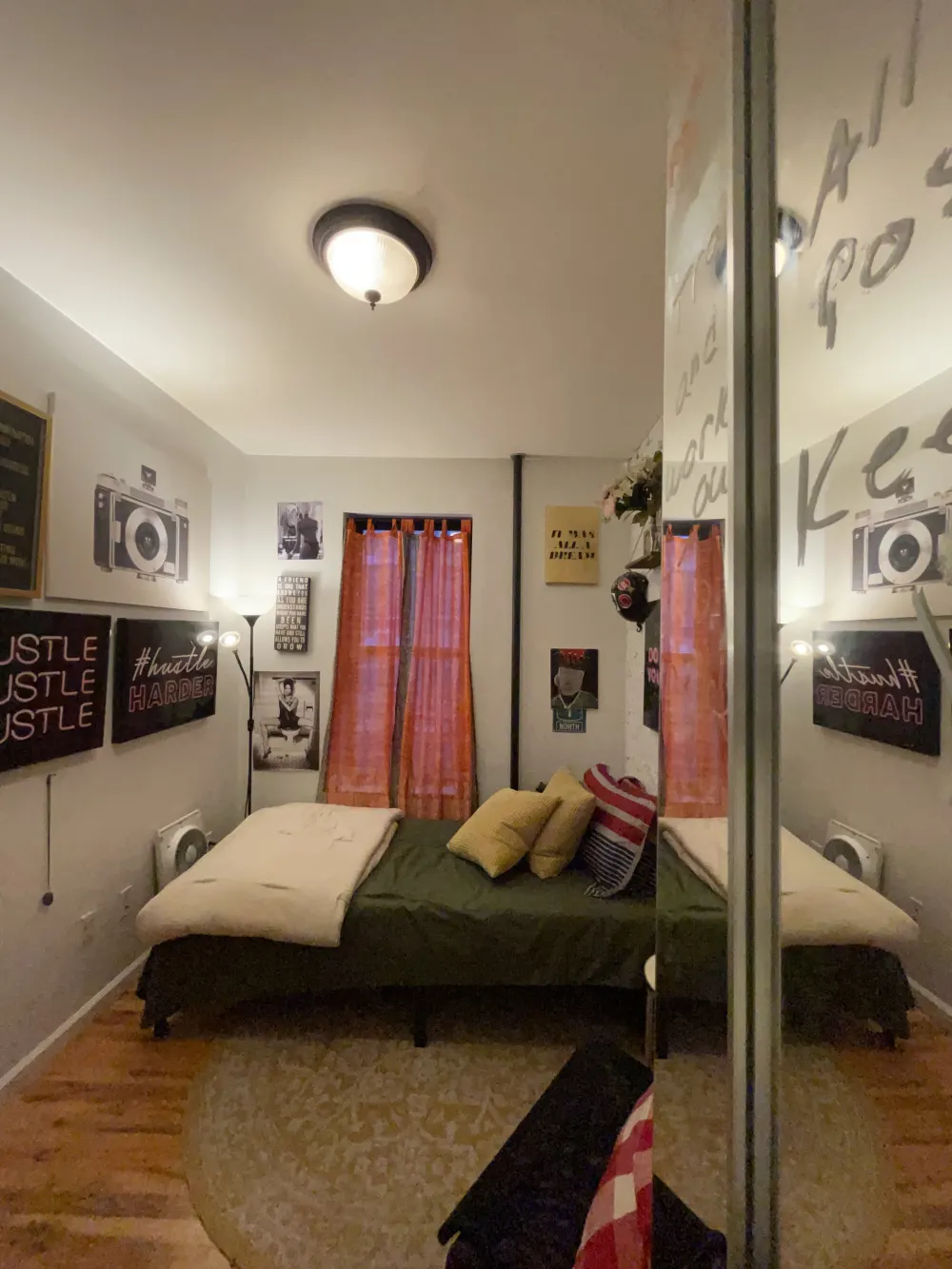 Cozy bedroom with motivational decor.
