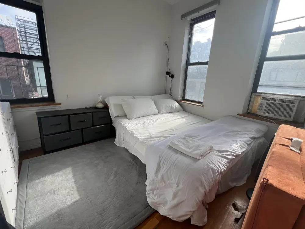 Cozy bedroom with minimalist decor.