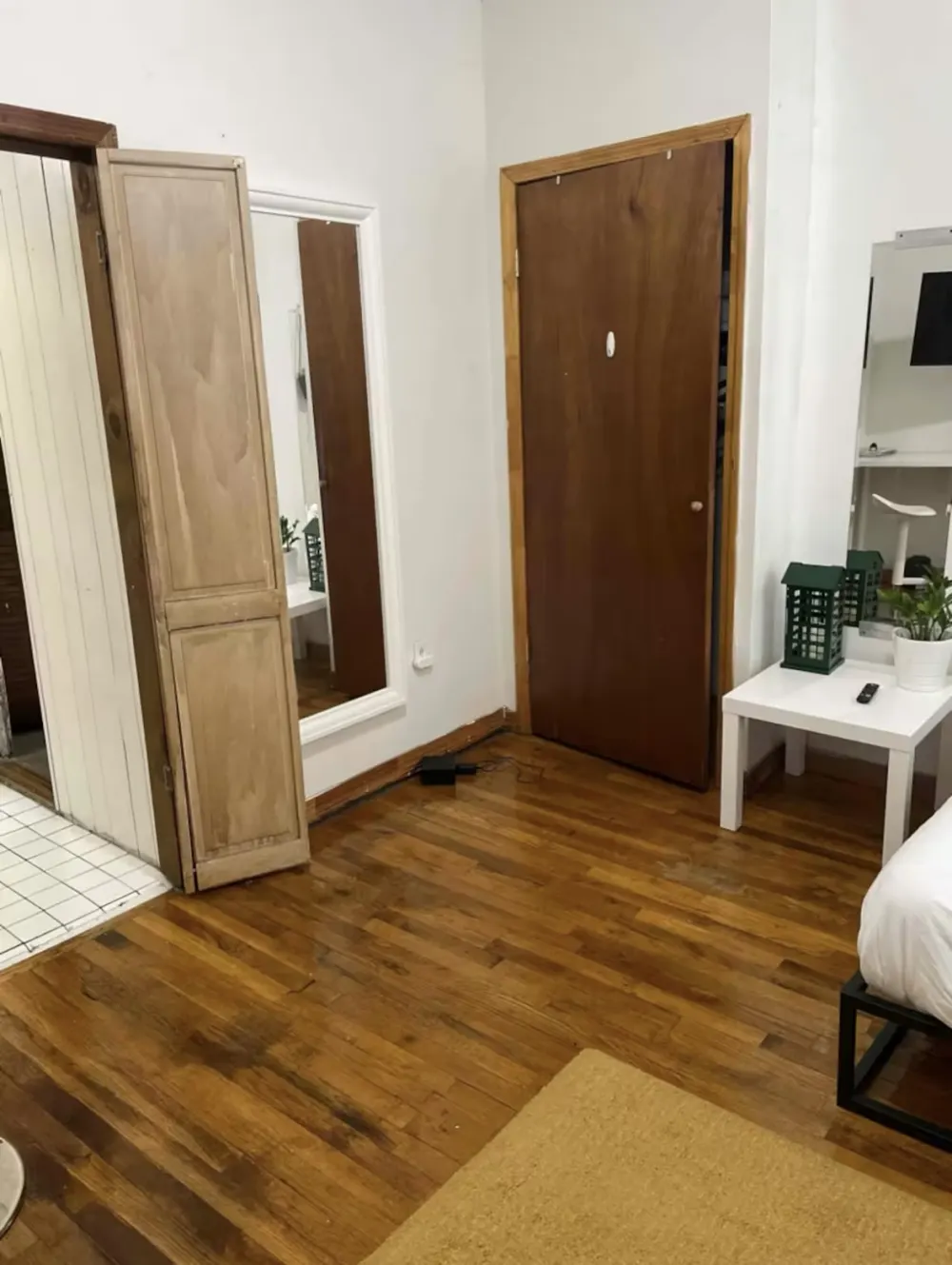 Cozy room with wooden floors.