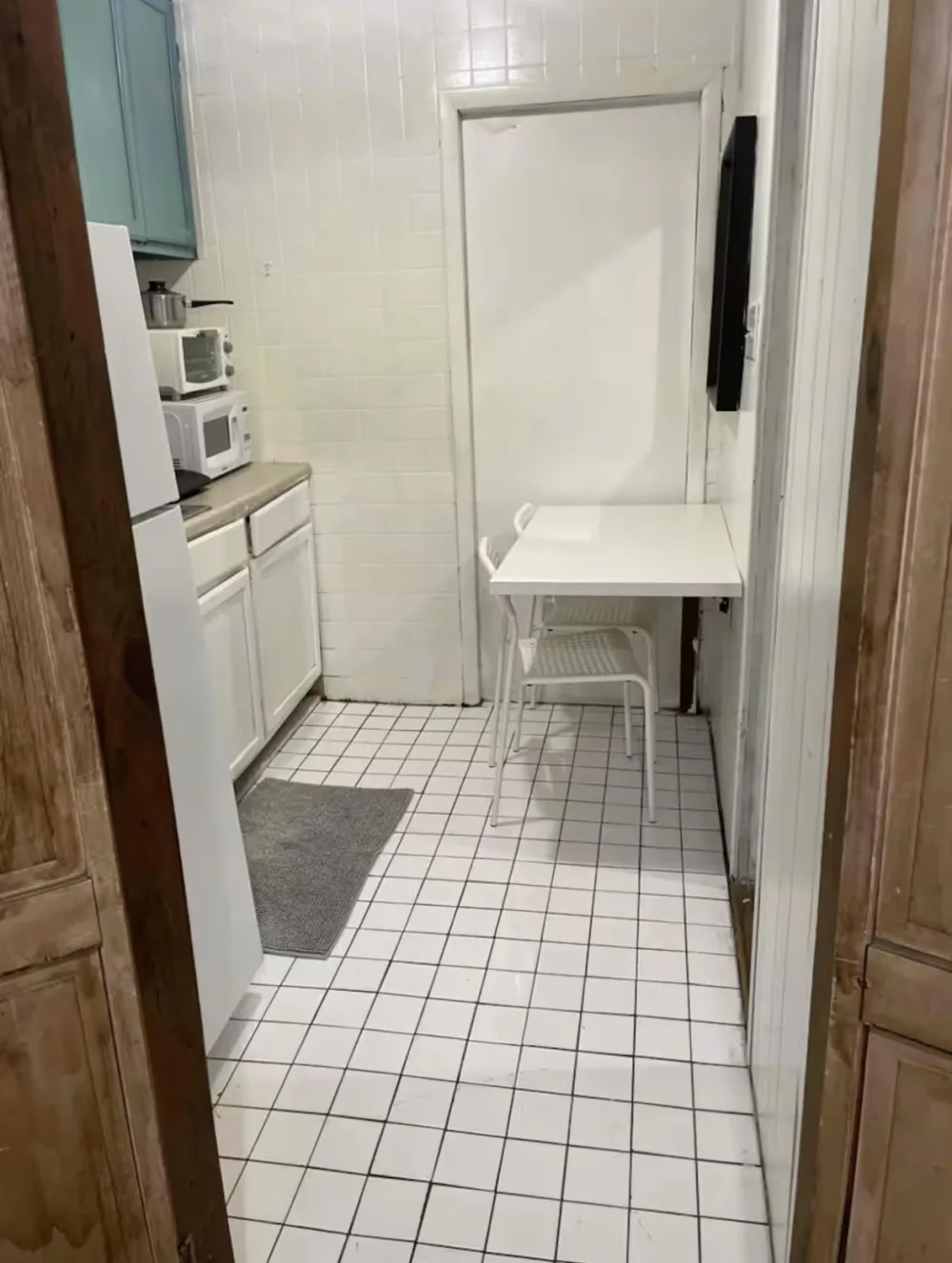 Cozy kitchen corner with table.