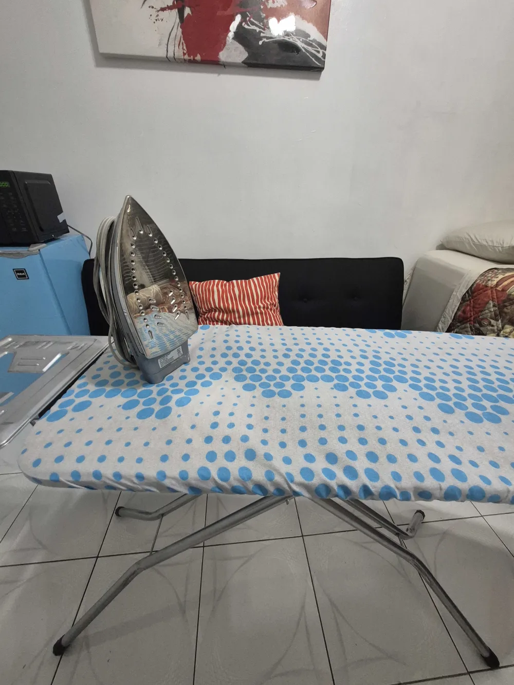 Ironing board with polka dots.