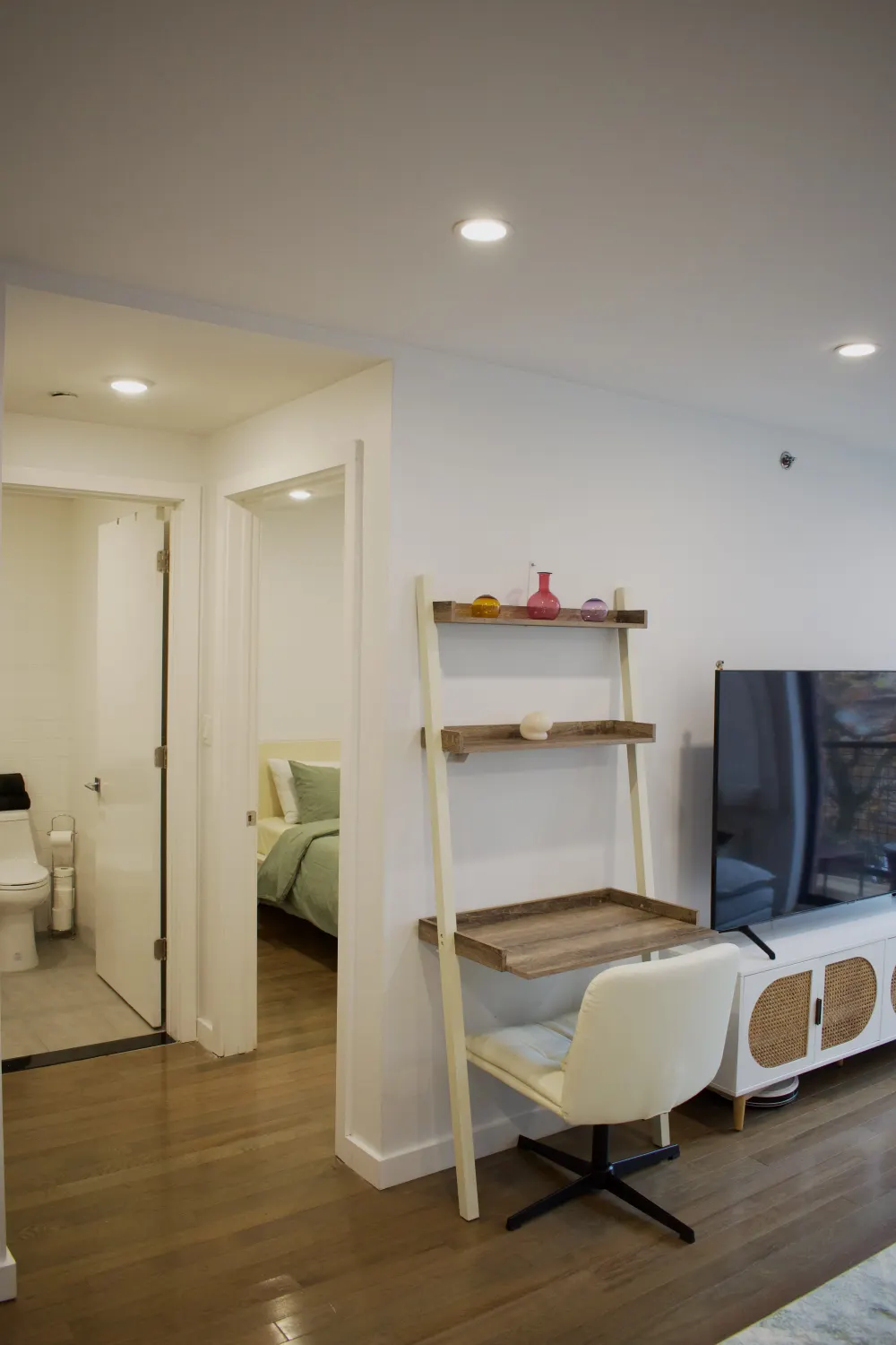 Modern apartment interior with desk.