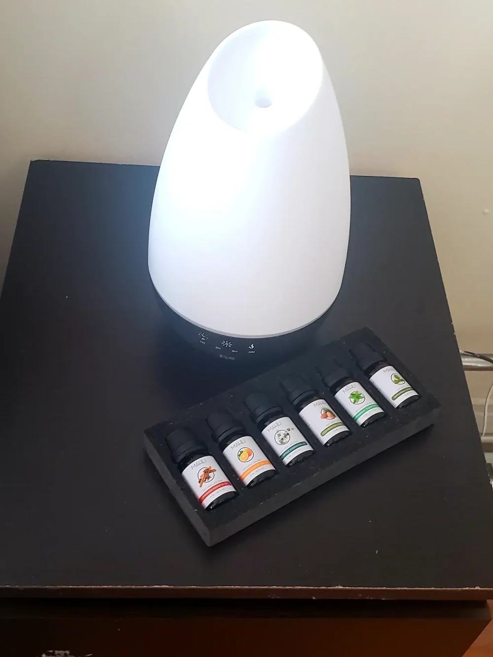 A diffuser with essential oils.