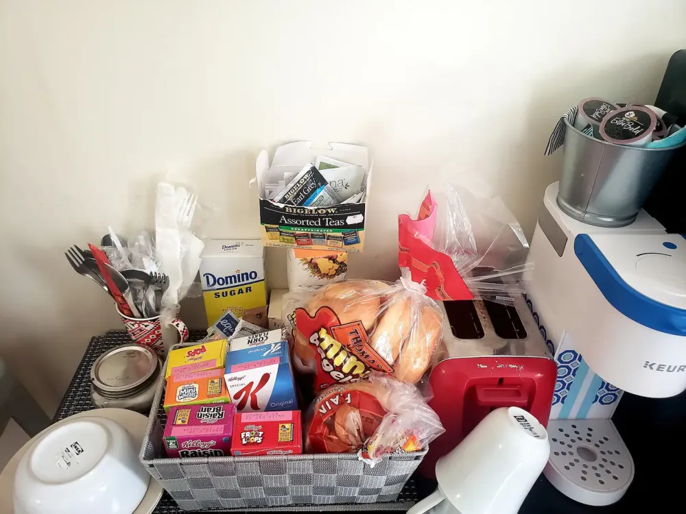 Breakfast station with assorted snacks.