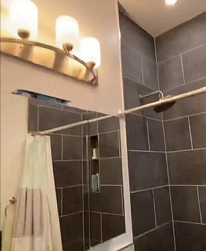 Modern bathroom with dark tiles