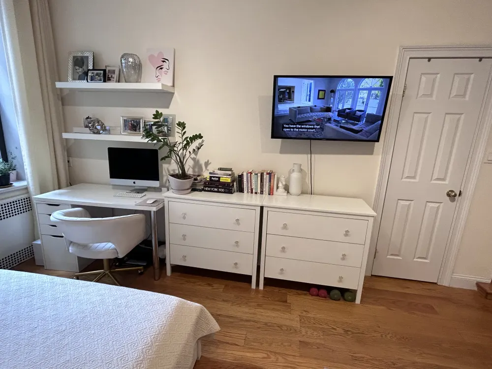 Modern bedroom with work area.