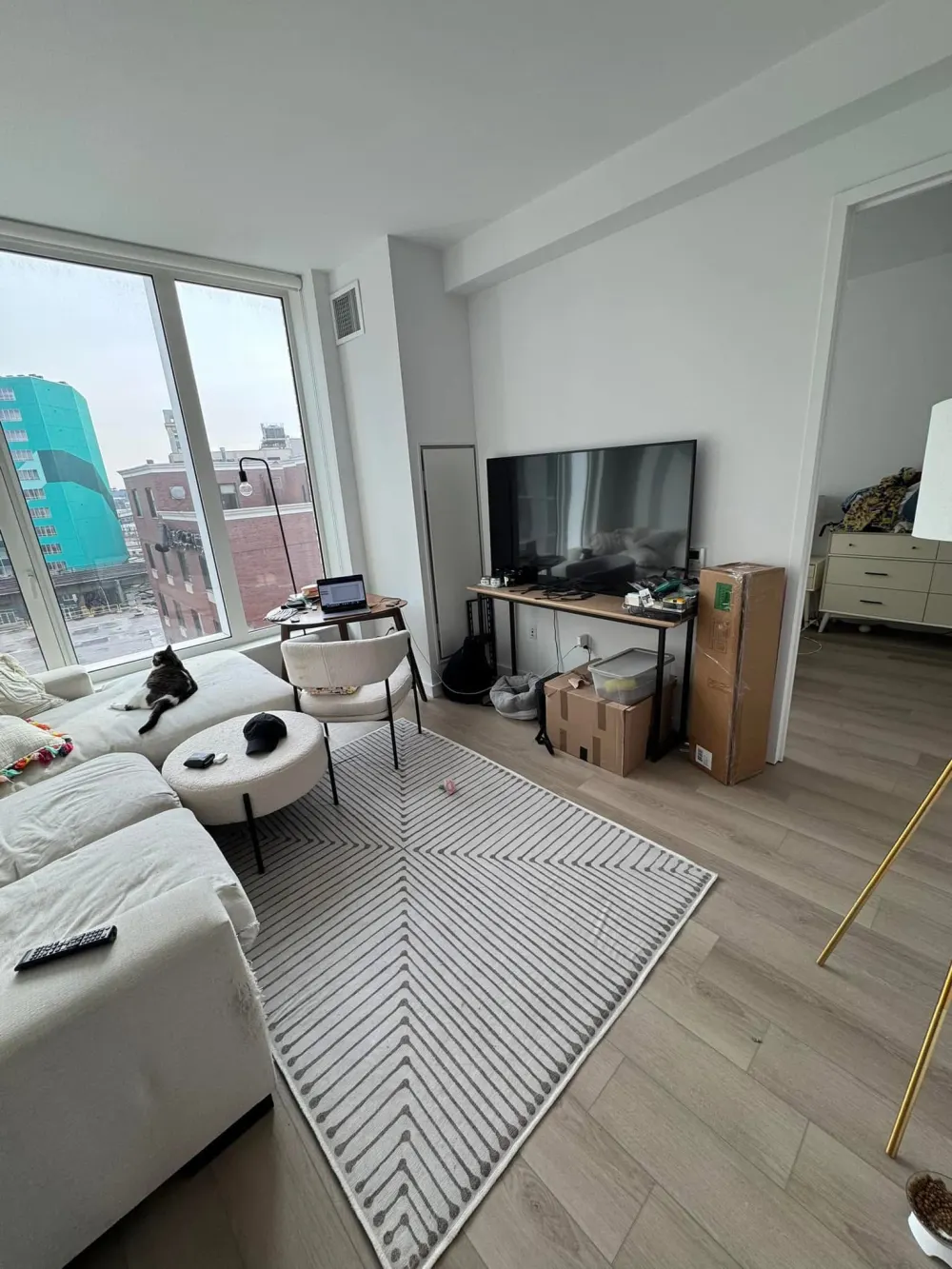 Modern living room with city view.