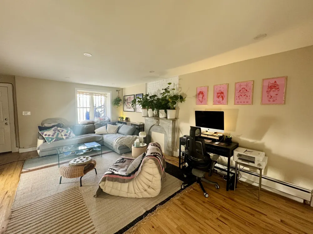 Cozy living room with workspace.