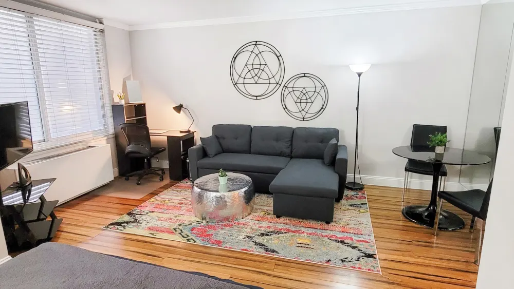 Modern studio with stylish furnishings.