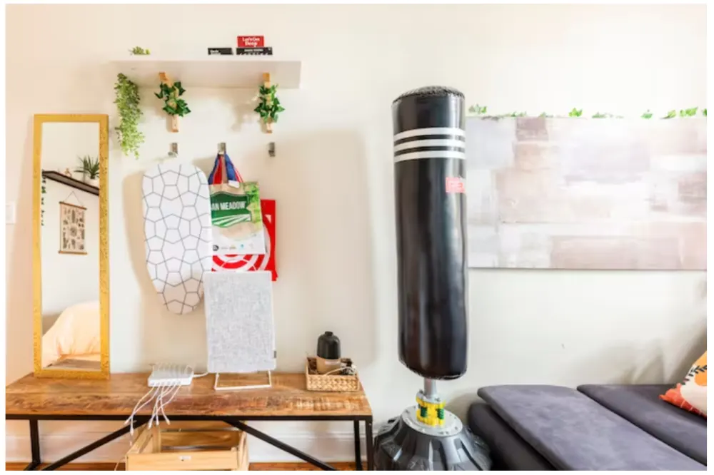 Cozy room with gym equipment.