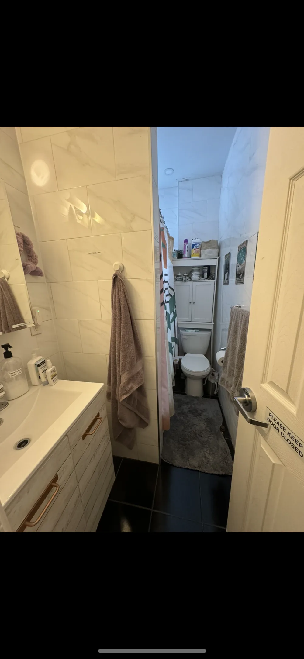 Compact bathroom with modern amenities.