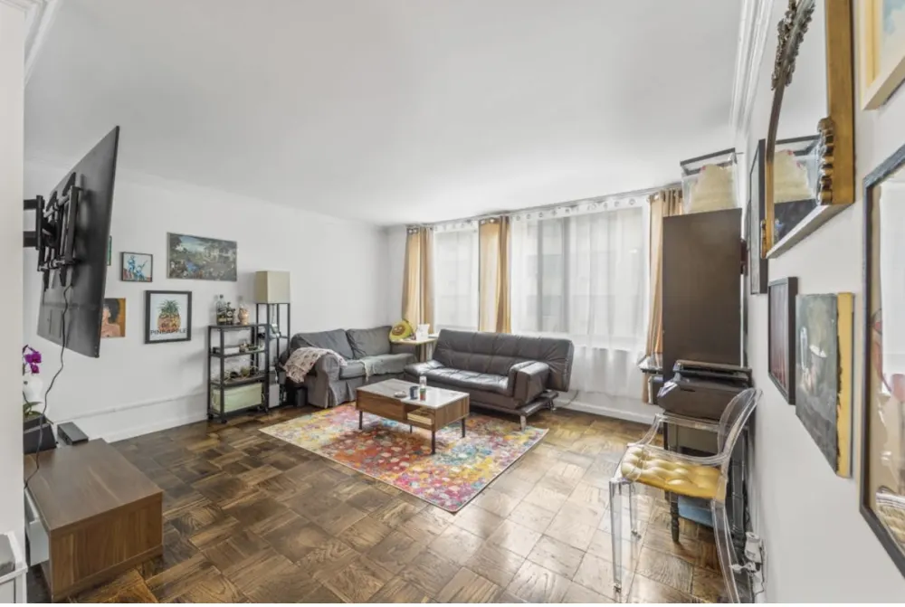 Spacious living room with sofas.