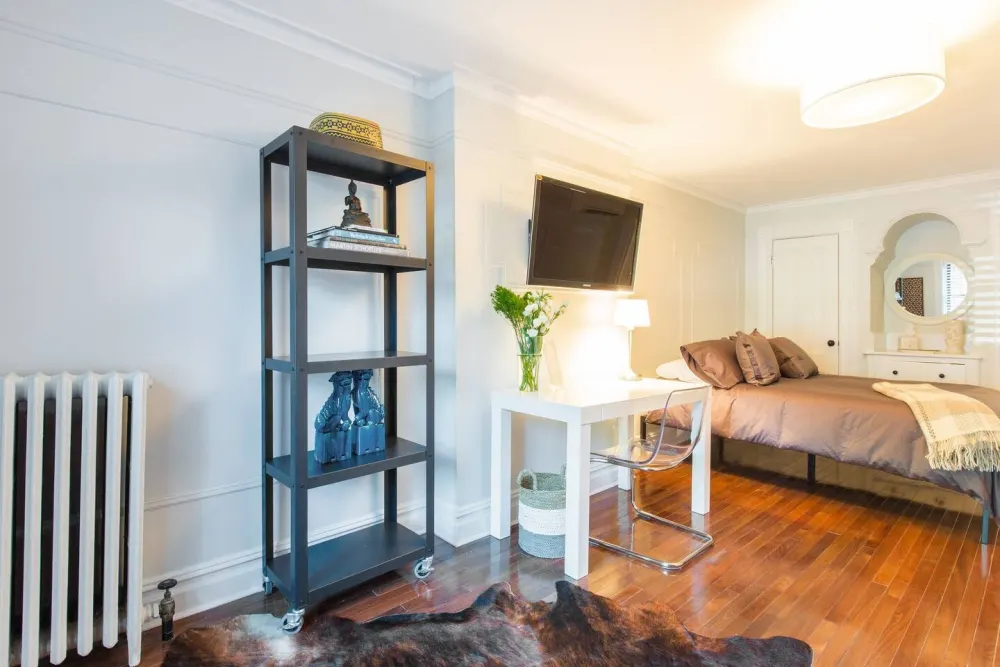 Cozy bedroom with modern furnishings.
