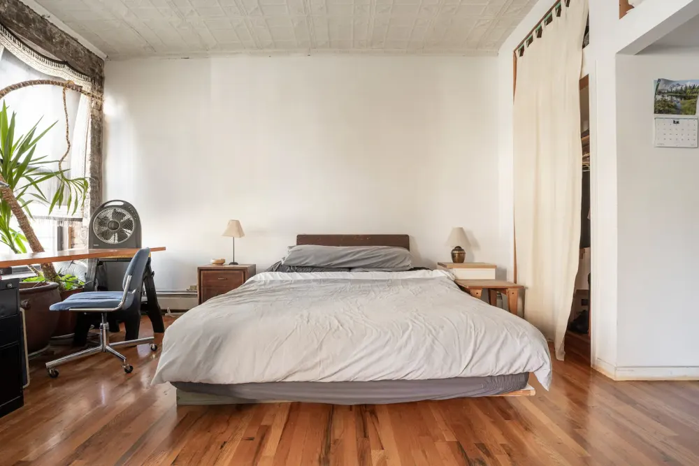 Simple bedroom with natural lighting.
