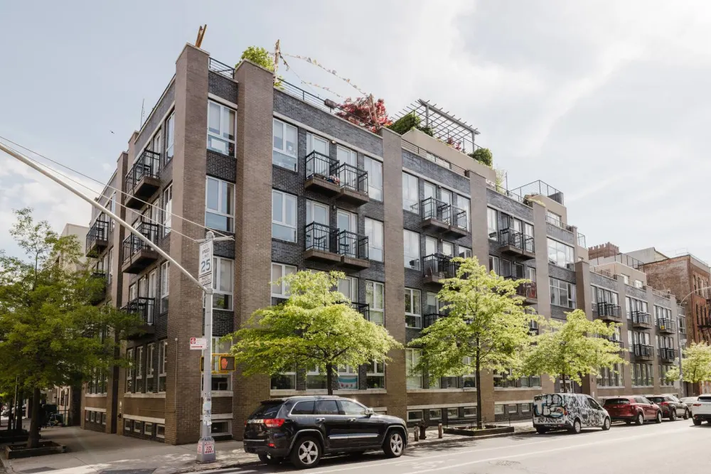Modern apartment building with balconies.