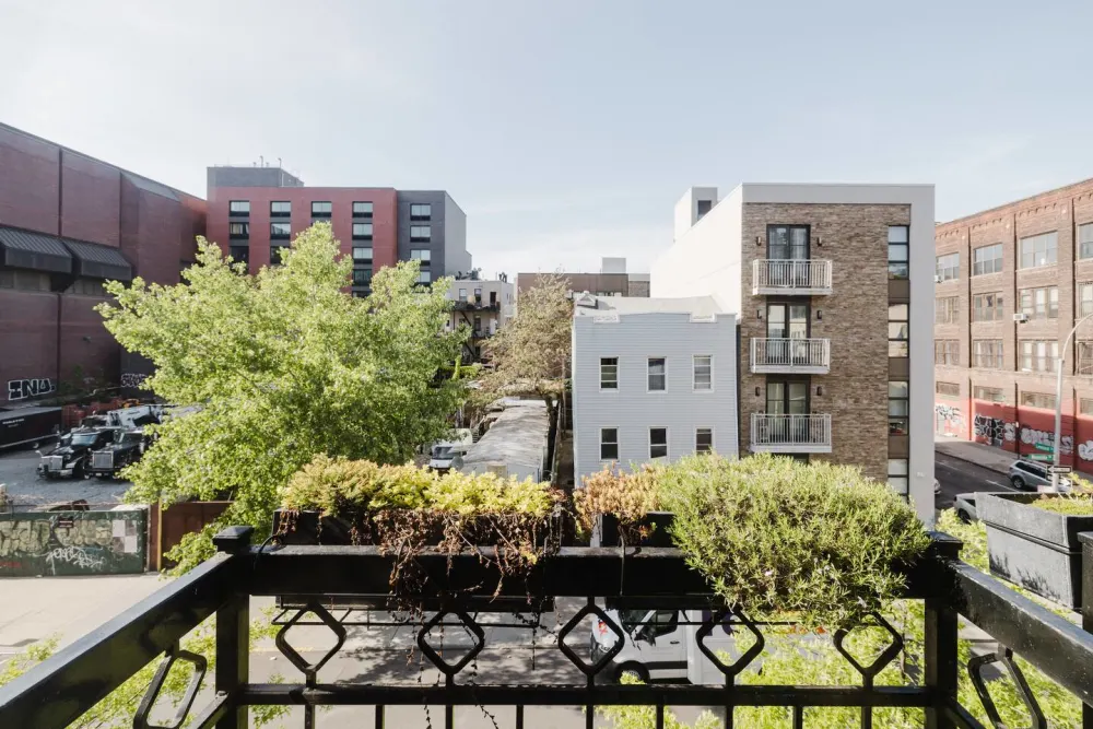Balcony view of urban buildings.