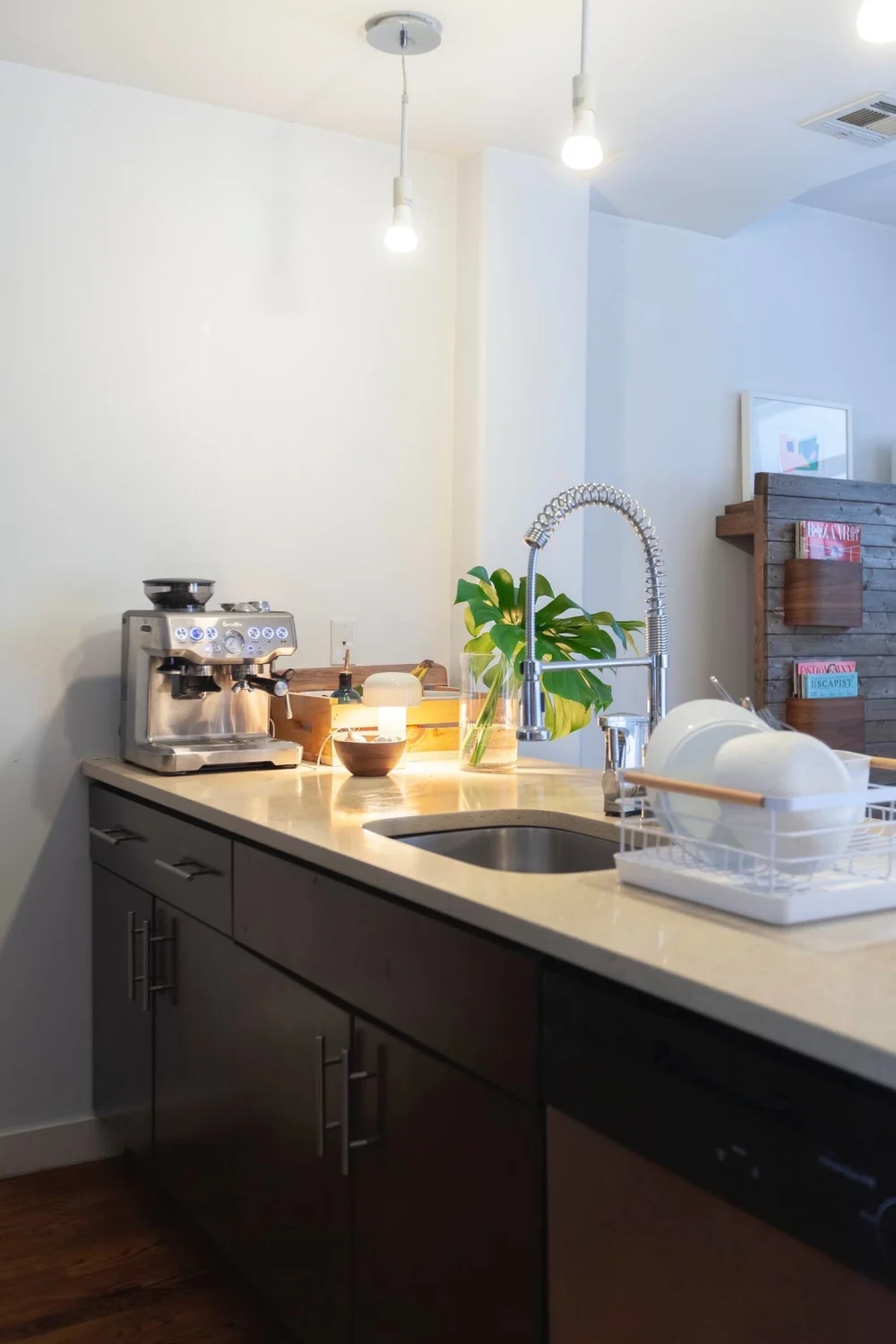 Modern kitchen with espresso machine.