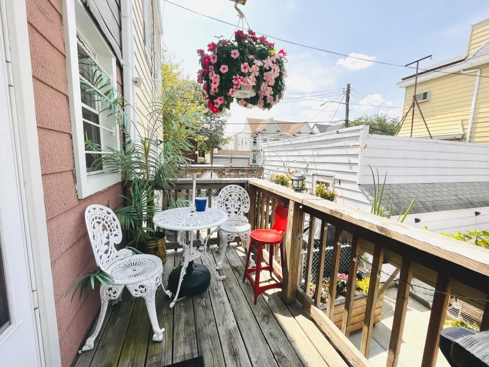 Cozy outdoor patio with seating.