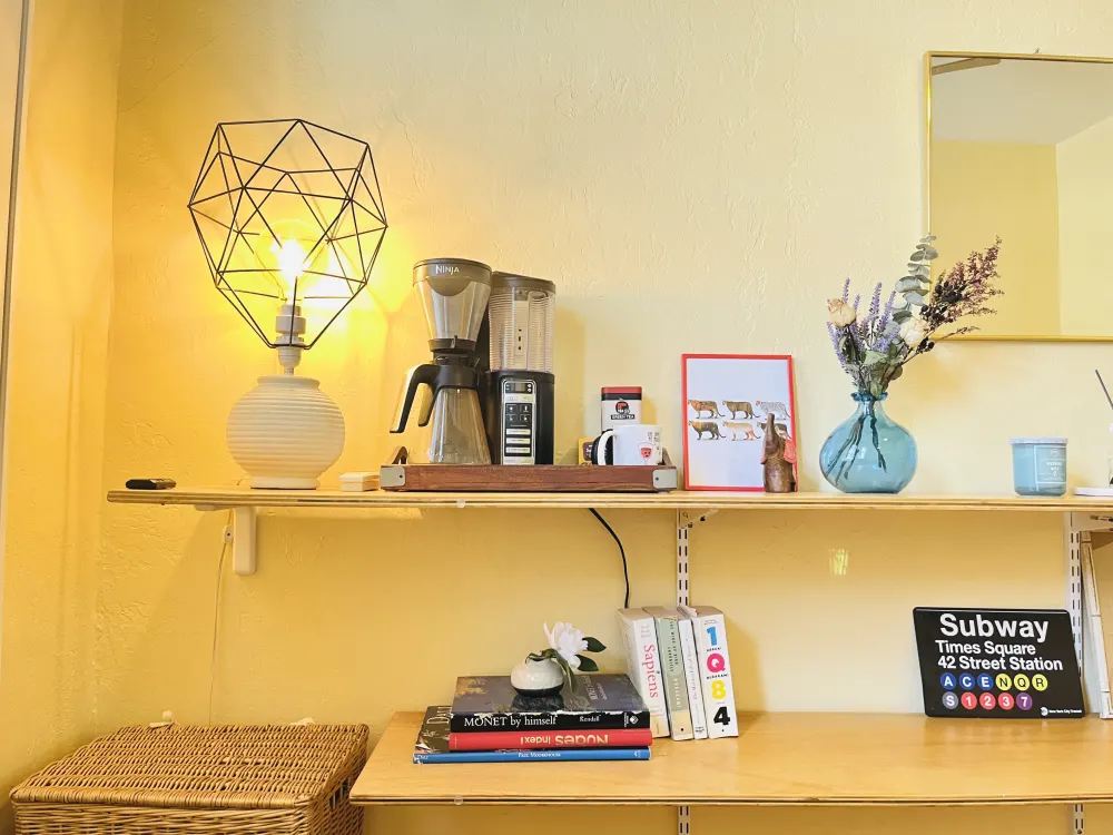 Cozy shelf with warm lighting.