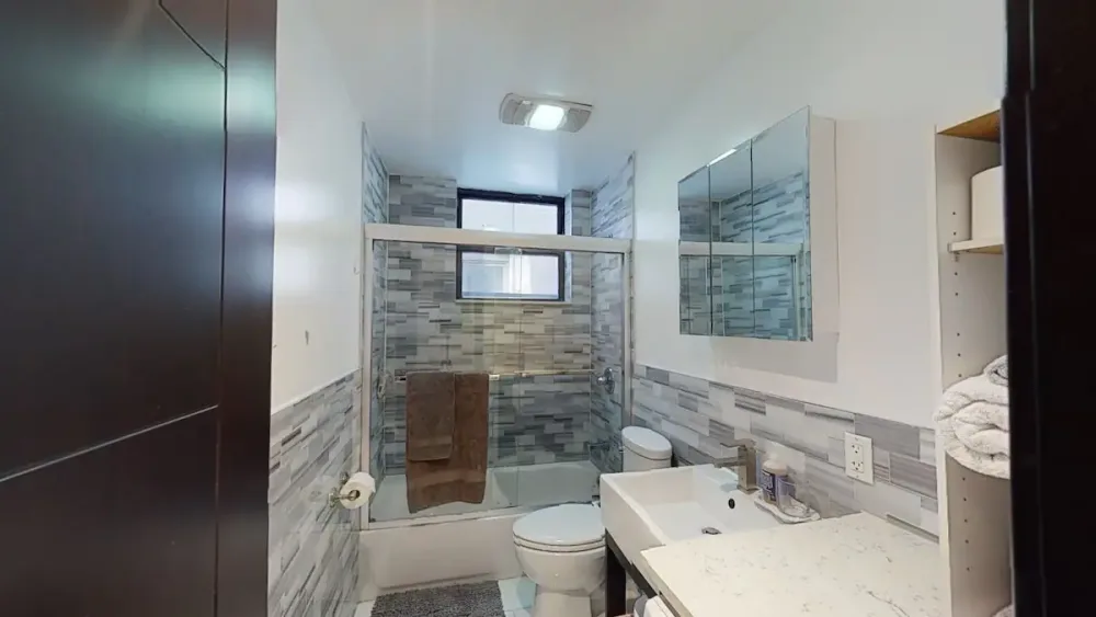 Modern bathroom with glass shower.