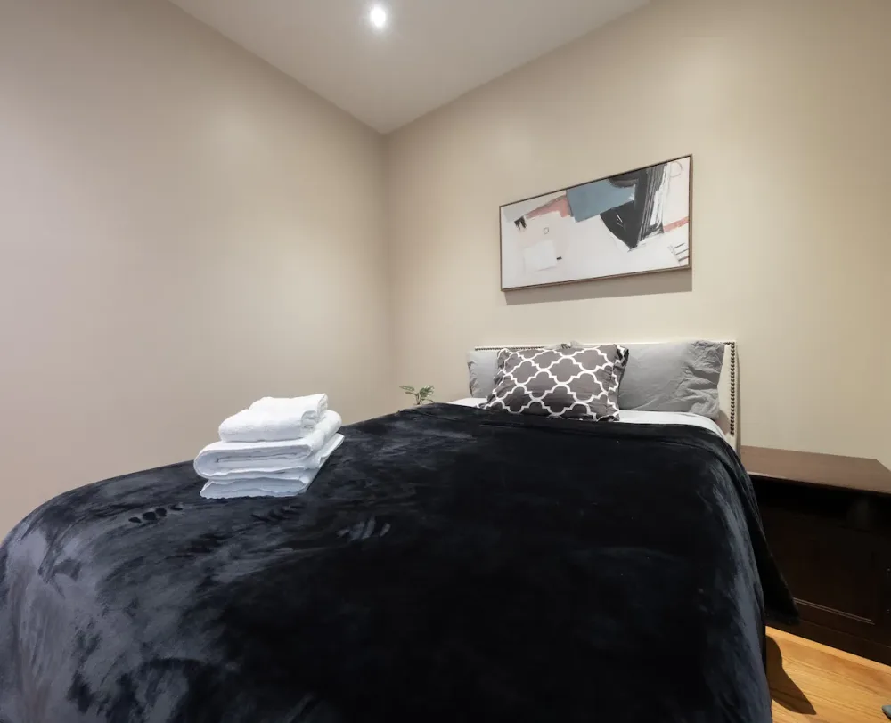 Cozy bedroom with modern decor.