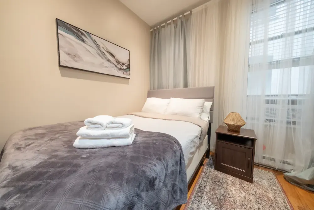 Cozy bedroom with modern decor.