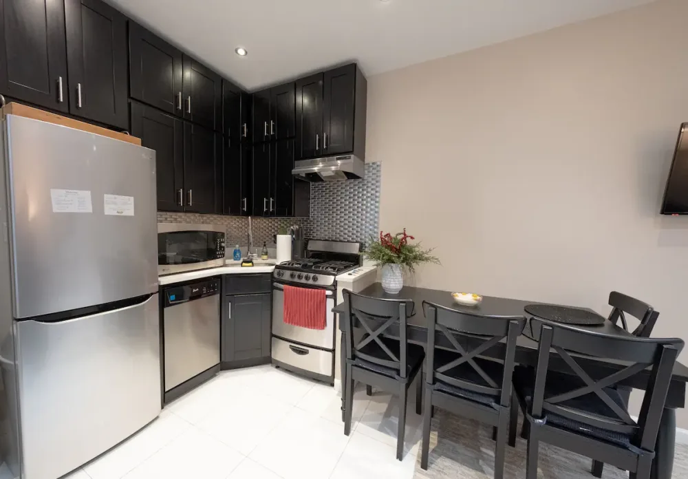 Modern kitchen with black cabinetry.
