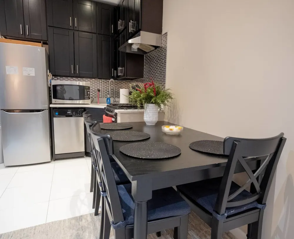 Modern kitchen dining area setup.