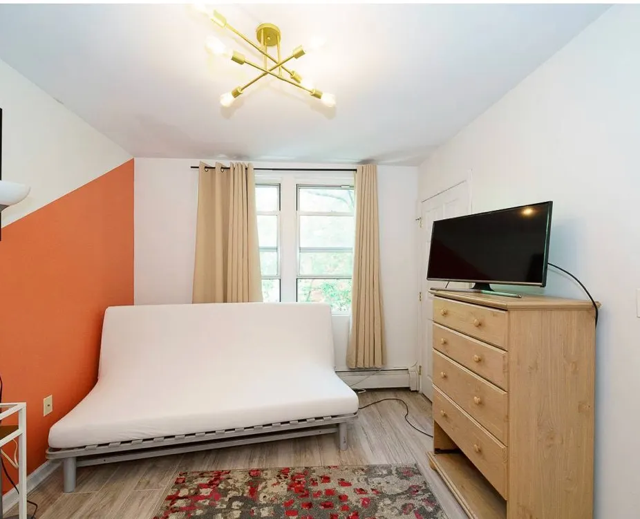 Modern cozy room, bright decor.