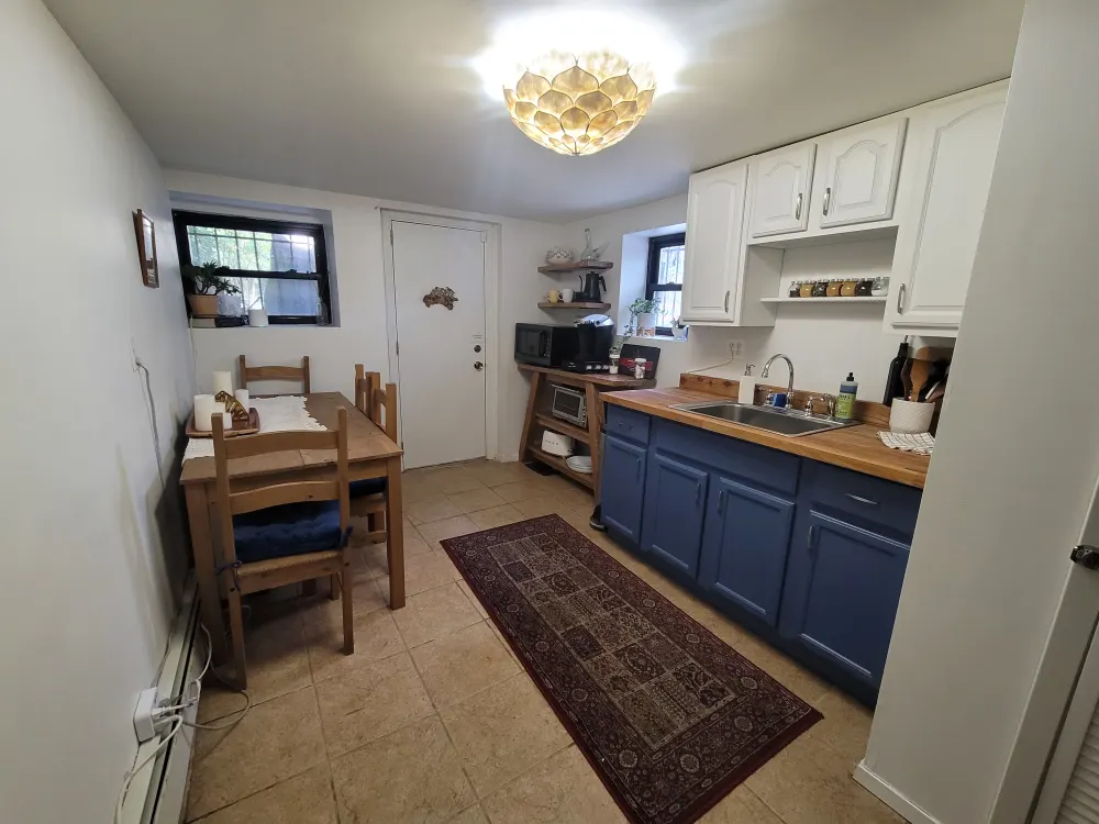 Cozy kitchen with dining area.