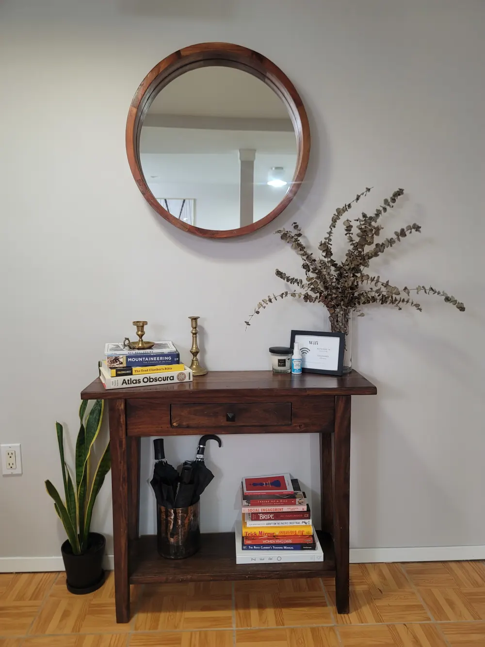 Wooden table with decorative items.