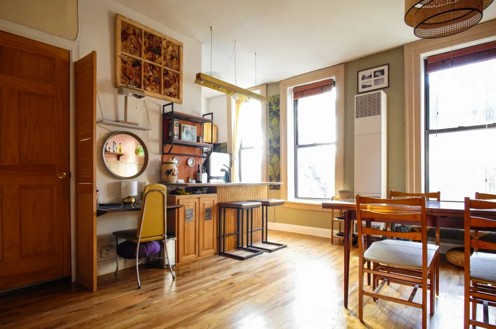 Cozy dining area with kitchen.