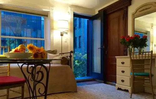 Bathroom with stained glass window.