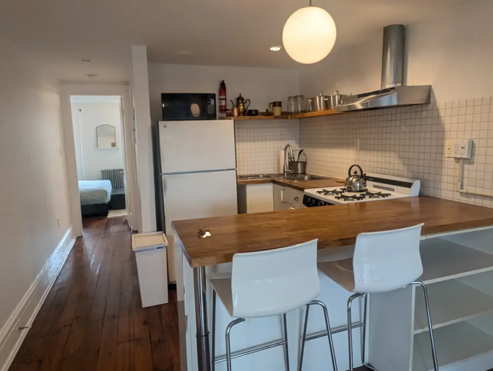 Cozy kitchen with wooden countertops.
