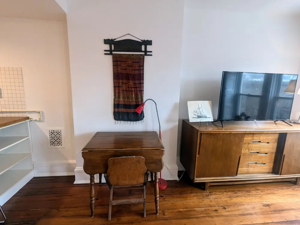 Cozy study nook with television.
